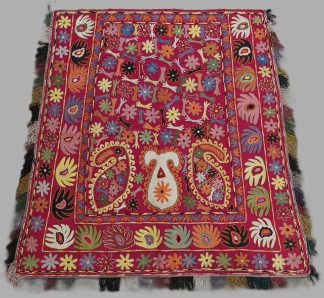 Antique Uzbek Lakai tribal ceremonial horse / saddle cover.
Size: 4ft 11inx 4ft 10in (150 x 147m) excluding tassels.
Circa 1920.

This beautiful embroidered horse / saddle cover was made by the Lakai tribe of  ...