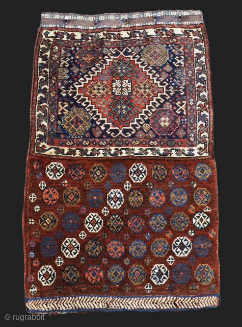Size: 3ft 10in x 2ft 5in (116 x 74cm). Opened size.

Antique Persian double faced saddle bag by the Qashqai or Luri tribe.

Circa 1890.

This outstanding saddle bag is of a rare format where  ...