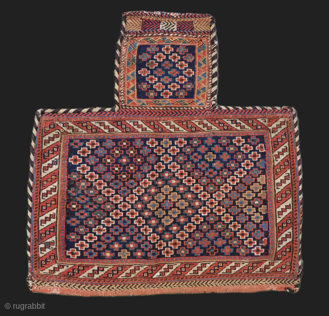 Size: 2ft 3in x 2ft 2in (69 x 67cm).

Antique salt bag by the Afshar tribe woven in soumak work.

Circa 1880.

This is a superb example of Afshar Soumak work with a diamond Lattice  ...