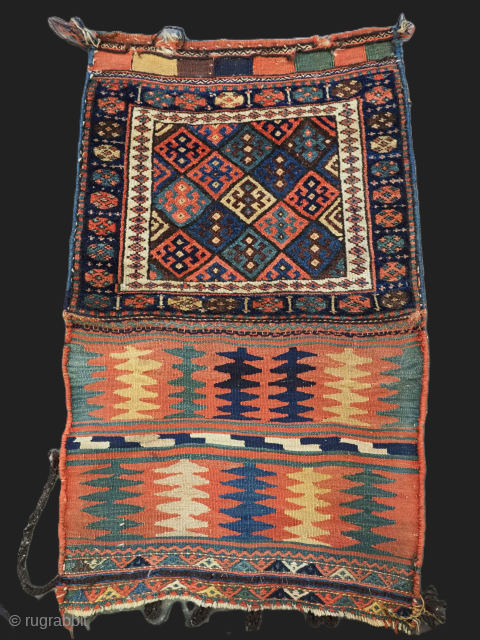 Size: 3ft 10in x 2ft 5in (117 x 74cm) including back..

Antique Jaf Kurd bag face of diamond lattice design with good clear colours and an attractive plain weave back with unusual design.

Circa  ...