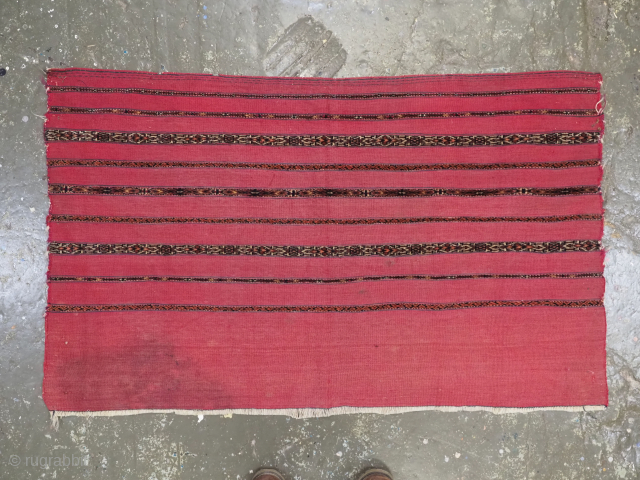 Antique Tekke Turkmen 'Kizil' chuval face with a traditional banded design in mixed techniques.
Circa 1880.
Size: 4ft 1in x 2ft 6in (124 x 76cm).
Chuval are storage bags used by the Turkmen nomads for ...