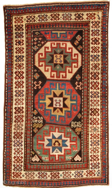 Kazak with Memlinc guls within octagons, 2nd half 19th century. Size: 201 x 112cm.                   