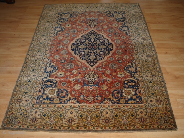 Antique Persian Sarouk rug of classic small medallion design, with floral sprays on an terracotta red ground. www.knightsantiques.co.uk 

Circa 1900.

This is a classic example of a Sarouk rug, well drawn with good  ...