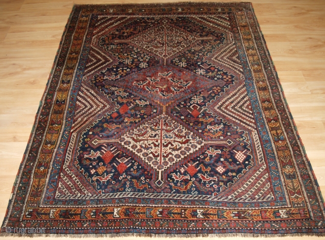 Antique South West Persian Khamseh Rug with three linked medallions. www.knightsantiques.co.uk 

Circa 1890.

A tribal rug of the classic bird design with the medallions and field covered with pecking chickens. The rug has  ...