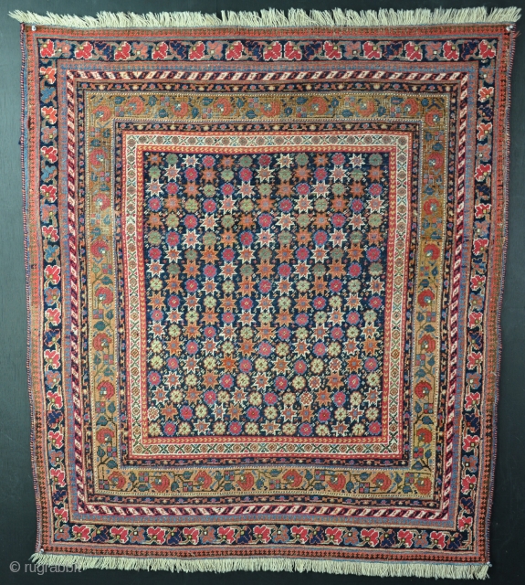An unusual Neriz Afshar rug, square and cute. All natural dyes, woven on wool. Slight corrosion in places, needs washing. Circa 1875.           