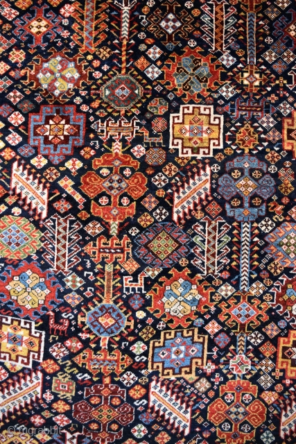 A very fine and exceptionally beautiful antique Shekarlu tribal carpet. Typical allover field design of animal figures, serrated leaves, flowers, rosettes and other filler elements woven in vivid natural dyes on rich  ...