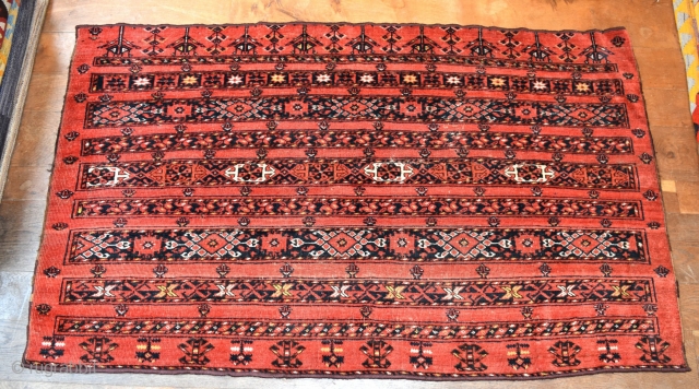 An antique Ersari chuval with good natural dyes. Good original condition traces of slight wear/corrosion, slight losses to top and bottom. A scarce piece with good age, clean and tidy, suitable for  ...