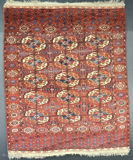 A good Tekke wedding rug with all natural dyes and good wool. The piece is in extraordinary condition, no wear or repair. hanging loops to rear. just needs a bath. circa 1880. 