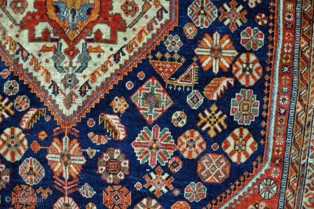 Antique Qasgai with shiney wool and good dyes, slightly low in places, but mostly in very good pile with no repairs. Late 19th century. 223x156cm        