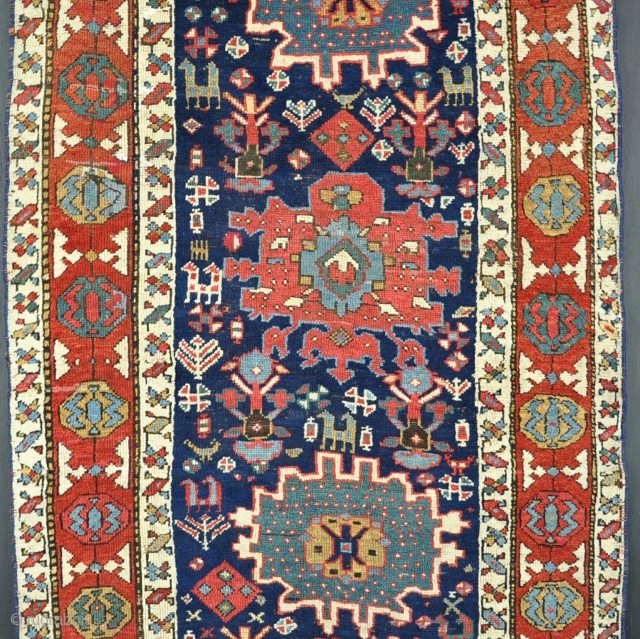 An antique Karaja long rug with funky drawing, lovely graphics and good wool and dyes. Sides missing a little faded reweave, but lots of thick luxy pile and original ends.Circa 1870. 310  ...