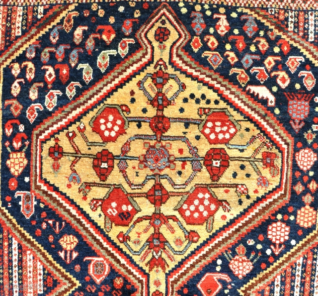 Antique Khamseh with juicy yellow medallions and fat glossy pile. Just one or two very small old crease repairs, otherwise in excellent order. Late 19th century. 220 x 135cm    