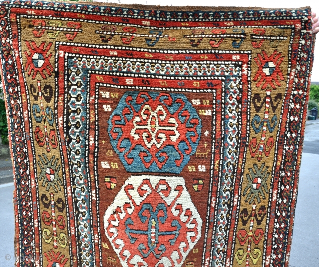 An antique Kurdish rug with good dyes in full pile. The design is clearly based on an early Borjalu kazak. One or two small holes, needs a wash. wool on wool. late  ...