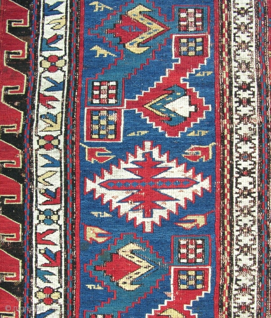 An antique Sumac carpet with funky border. Slight wear corrosian in places, one small hole, slight loss to ends,dirty but not stained. about 1cm of Fushine in one end, otherewise good dyes.  ...