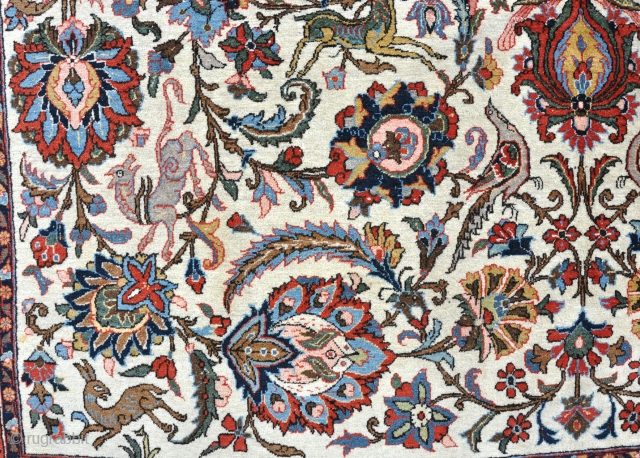 An old Qum carpet with soft dyes in near perfect condition. First quarter 20th century.348x231cm                  