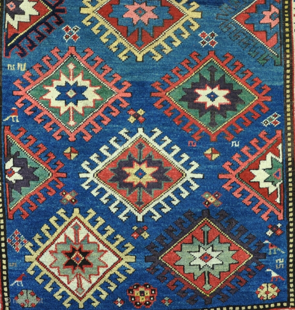 A good Genge/Kazak rug with vivid dyes including nice nice purple and lovely wool. Minimal restorations, very clean and jewel like piece. 19th century. 215x132cm        