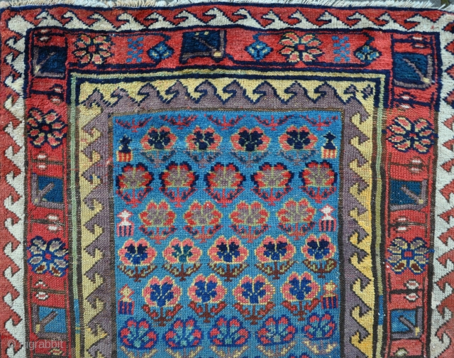Unusual SaugBulag runner, very long and narrow, with vivid dyes. Quite a lot of decent quality reweave, but clean and floor ready. 548x89cm. Mid 19th century.       