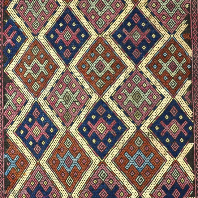 An antique Verneh cover(?) unusual small size with organic dyes in excellent original condition.  Late 19th century. 142x77cm              