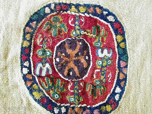 Large Coptic tunic fragment w/ two very colorful roundels and a brocaded bottom panel, also Coptic, but probably added later.             