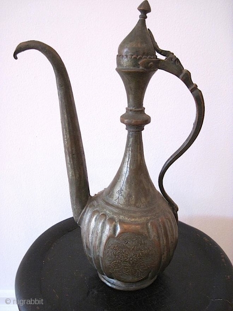 Middle Eastern ewer, copper, c. 1800, w/ hammered floral decoration.                       