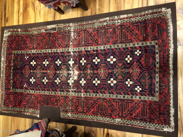 Baluch Rug Circa.1900 mounted on Canvas.possible to send larger images.                       