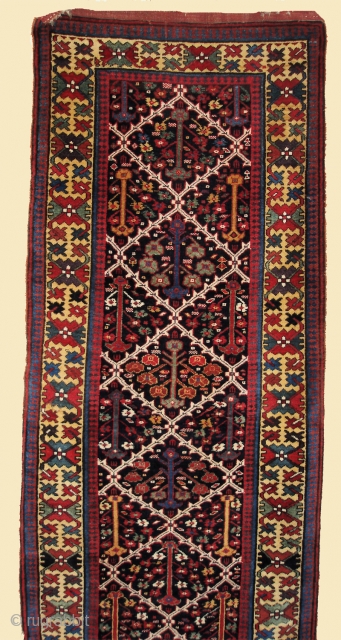 3'7" x 13'2"     Antique tribal runner. Circa 1900.  Probably Northwest Persian but with Bakhtairi or Luri characteristics.
Navy field with a "Shrub" design. Beautiful yellow border. Generally excellent  ...