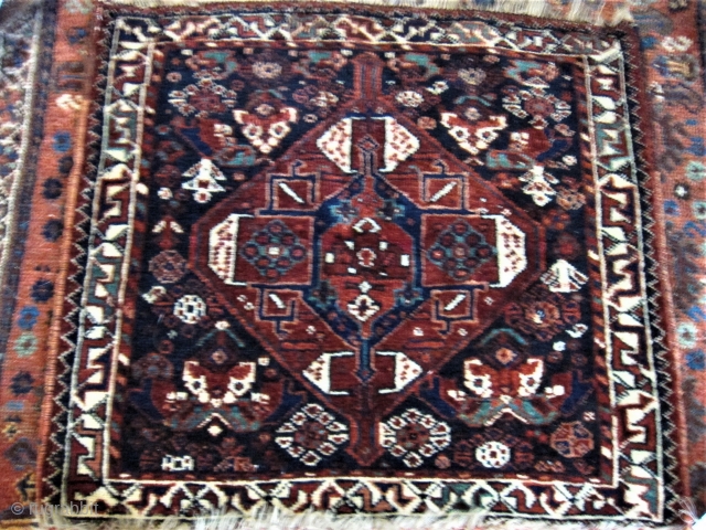 1900 Quashgai Bag 24 1/2 x 27 1/2" a small 
	moth nip, missing small amount at top 
 	and bottom. Exc. Pile beautiful wool w/firm
 	feel, you won't find many pieces anywhere
	with  ...