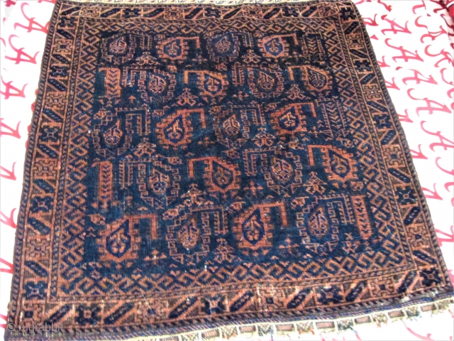  
        Elegant Boteh pattern on Blue field 27"
        X 27 1/2" probably Beluch. Delicate flat
	weave on ends.  ...