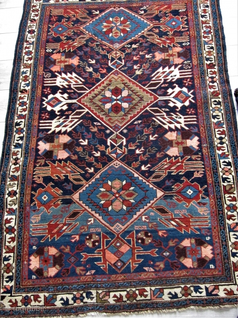 19th Cent. Kuba Rare Pattern Photo Included from Luciano Coen Book - The Oriental Rug.
Lots of colors including Watermelon, Deep Blue and Green, Wild Abrash at one end.
Length 62" x 42".  