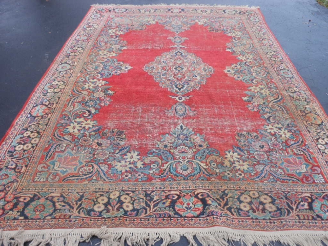 Persian Sarouk, circa 1940, 8-9 x 11-9 (2.67 x 3.58), original ends and edges, worn, no holes or rot or hard places, sewn on fringe, rug was washed, plus shipping.   