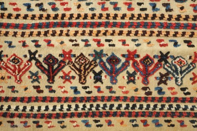 Qashqa'i horse cover, late 19th century. Beautifully saturated naturally dyed motifs. The flaps are different in design from one another. a bit of repiling in the left hand flap visible in the  ...