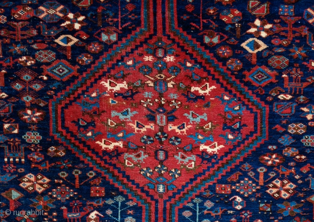 Khamseh Rug, Late 19th/early 20th Century.  Fantastic deep indigo blue ground.  Exceptional border.  Natural colors.  Possibly Arab Jabbareh group but the knots are symmetrical.  171 x 212  ...