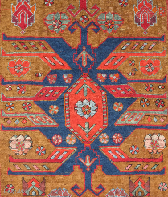 Caucasian rug, late 19th/early 20th century.  The large eagle medallions appear in Talish rugs and the weave has some similarities to Talish weaving. The colors and layout of the borders suggest  ...