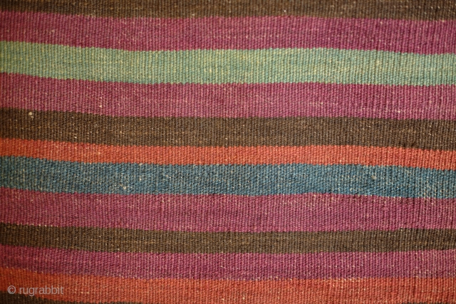 Kohistani saddle bag from Badghis area of Afghanistan.  Late 19th Century.  This has a beautiful striped back in natural colors.  Colors are all good.  Some of these bags  ...