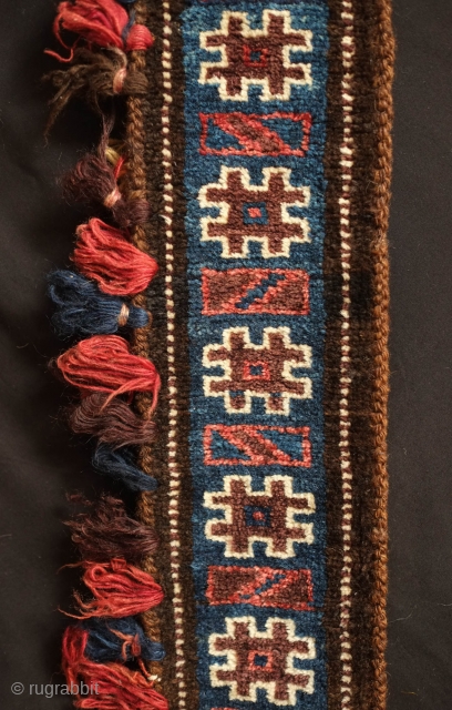 Baluch Camel neck colar. 19th Century.  Almost all good colors with some fading in the red tassel and in some of the white pile.  Overall good condition with wear in  ...