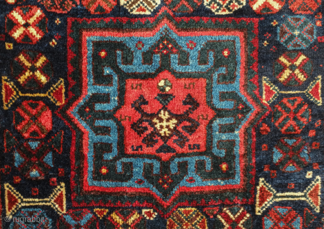 Lori saddle bag, one side, 19th century. Lustrous wool. Excellent drawing in the central medallion which floats on the field and other motifs. Dark duck head green in the arms the medallion.  ...