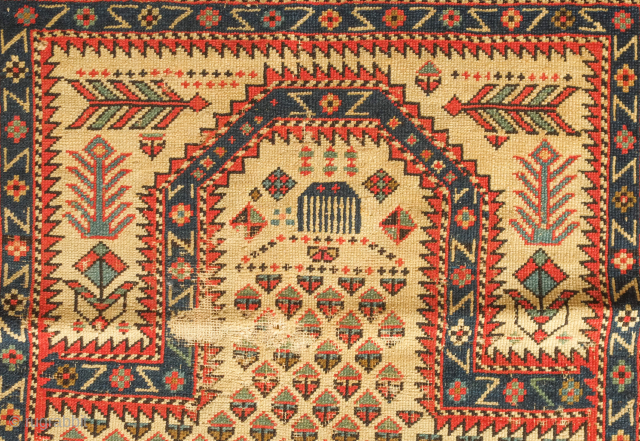 Shirvan prayer rug, mid-19th century or so.  Note the small animal figures in the inner border.  Wear in the field. 77 x 143 cm.  Contact danauger@tribalgardenrugs.com    