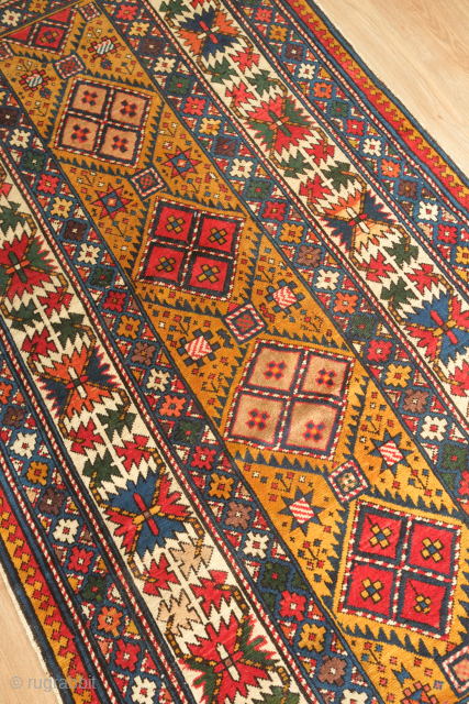 Shirvan rug, 19th century.  Deep yellow field.  Fantastic condition with good pile.    112 x 228 cm. Excellent range of colors numbering 7 or 8 colors including a  ...