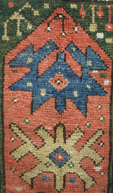 Mihaliccik or Monastir rug, 19th century. Wonderful color palate. Reasonable pile. Six colors used including a purple and deep duck headish green.  105 x 154 cm.  Contact danauger@tribalgardenrugs.com   