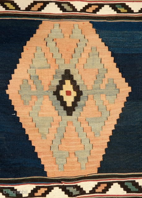 Caucasian Kilim, Late 19th Century.  Large hooked medallions. Colors are all natural dyes and contains some soft muted colors.  Great fine weave. 185 x 296 cm     