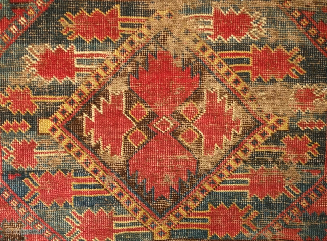 Beshir rug, 19th century. Atypical design scheme.  Worn but design visible.  Mounted on linen and ready for display.  107 x 209 cm, linen 130 x 237 cm. Contact danauger@tribalgardenrugs.com 