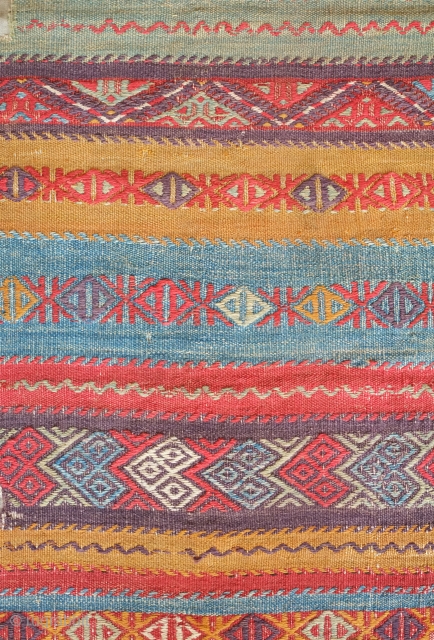 Kutahya chuval, mid-to early 19th century, possibly older. Excellent colors showing its age.  Mounted on linen.  103 x 192 cm, Linen 119 x 208 cm.  Contact danauger@tribalgardenrugs.com   