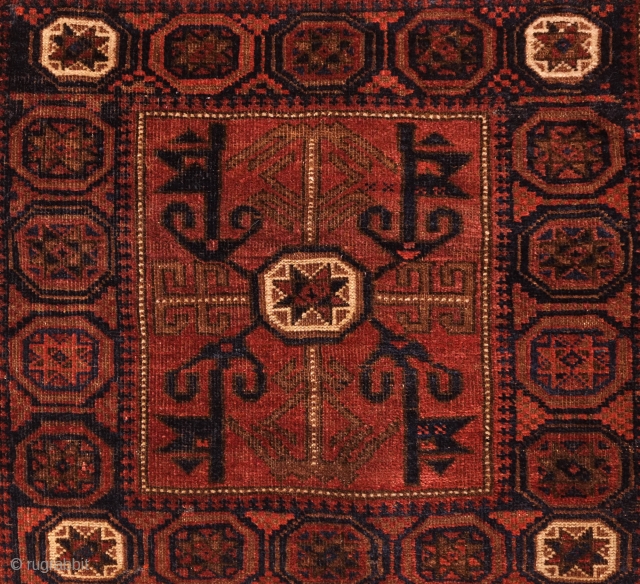 Baluch Bag, Late 19th/Early 20th Century.  Possibly Adraskhan area of western Afghanistan.  Dark and in muted tones on the front but captivating in design.  The back is in soft  ...