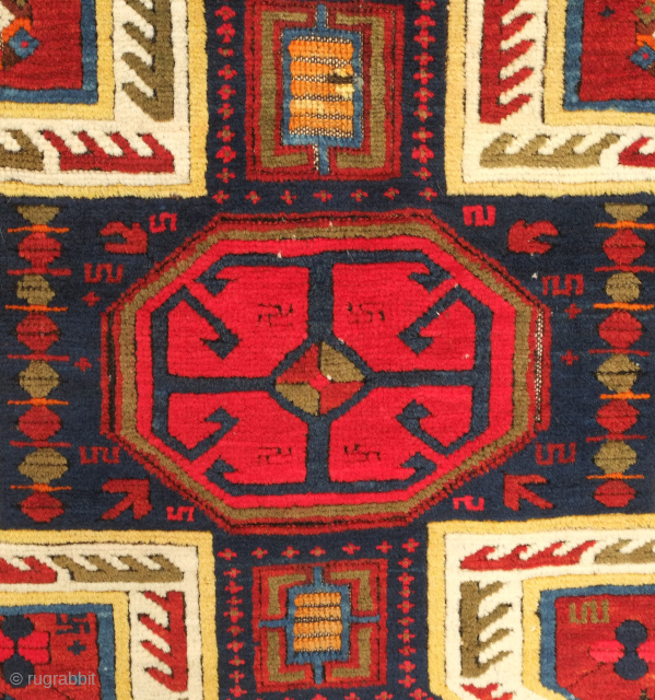 Kuba pole medallion rug, 19th century.  Fantastically drawn kochaks in the pole medallion.  It boasts a myriad of motifs such as Harshangs, swastikas, birds, Talish rosettes, tulips, compartments, and others.  ...