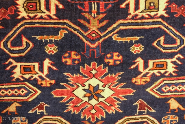 Perepedil Rug, Last decade of the 19th century.  Excellent wool and a deep blue ground.  Small dragons, rams horns, kufic borders, endless knots and all.  126 x 205 cm 