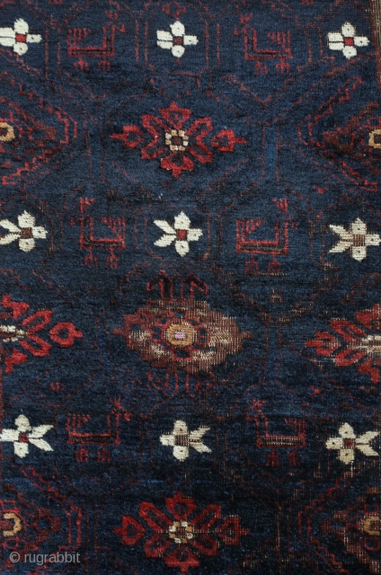 Baluch Rug, possibly Kashmar area Khorasan, Mid to 3rd quarter of the 19th Century.  Very dark brooding tones of blue and deep rich red.  Birds interspersed throughout the mina khani  ...