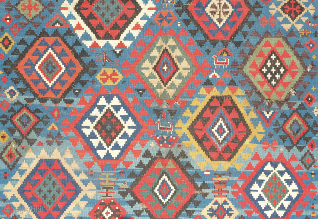 Shirvan kilim, 19th century in smaller format.  Rare border type. Paper thin weave. Animal figures in soumak weave throughout the bottom half of the kilim. It has a couple of holes  ...