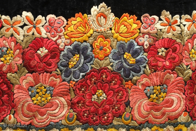 Hungarian Apron, Early 20th Century. Silk embroidery in a blitz of colorful flowers.  Cotton net at the bottom section.  An incredible example.  68 x 95 cm    