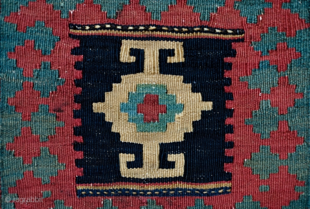 Shahsavan chanteh, late 19th Century. Compelling single central kochanak design.  Good colors in a muted palette. Hashtrud group. 28 x 31 cm.          