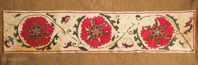 Uzbek suzani border fragment, 3rd to 4th quarter of the 19th century.  A few of the inner petals are in wool some of which has corroded due to a corrosive quality  ...