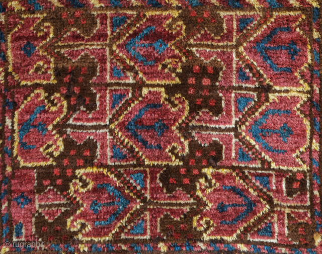 Beshir saddle bag face, 19th century. The wool is silky soft and the the colors rich with a shiny salmon-pink red. The pile is full and the feel is floppy. 54 x  ...